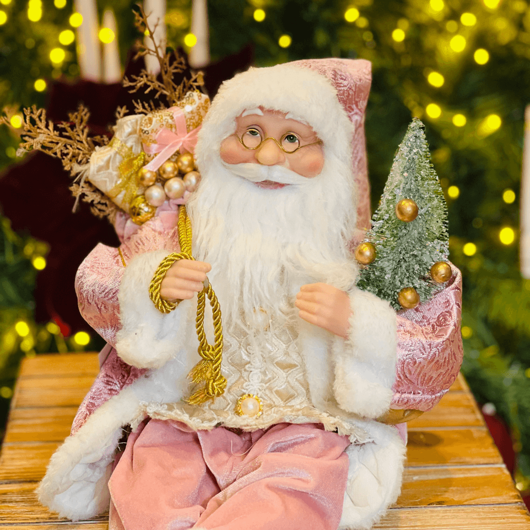 Papai Noel Sentado Com Presentes Rosa 28cm