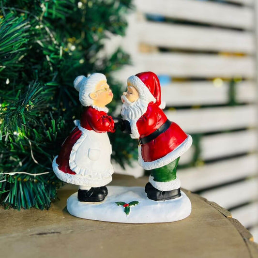 Natal Mamae e Papai Noel Beijo