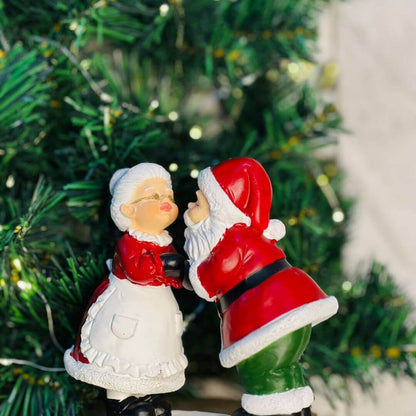 Natal Mamae e Papai Noel Beijo