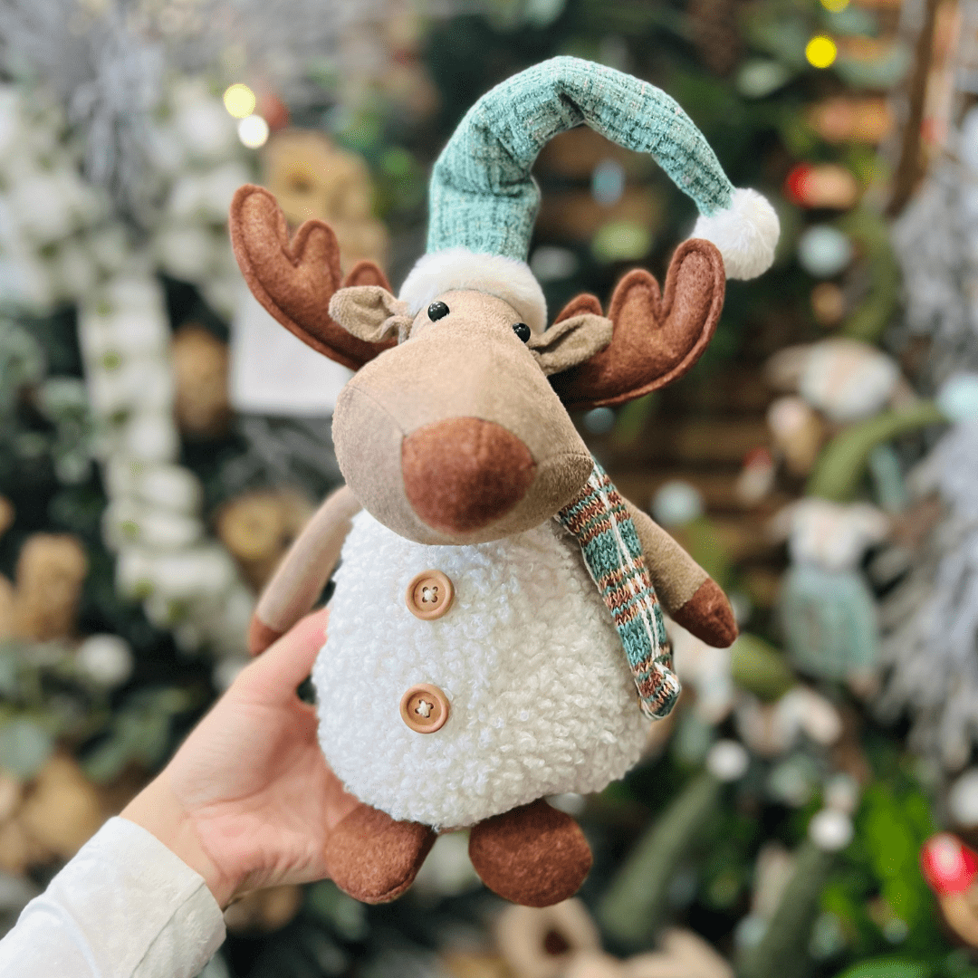 Rena Natalina de Pelucia Com Gorro Verde 25cm