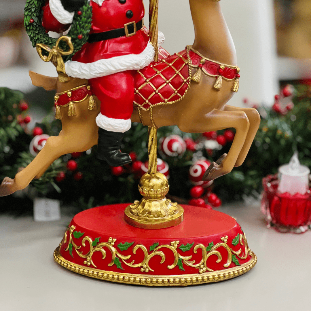 Papai Noel no Carrossel Vermelho de Resina 45,5x28,6cm