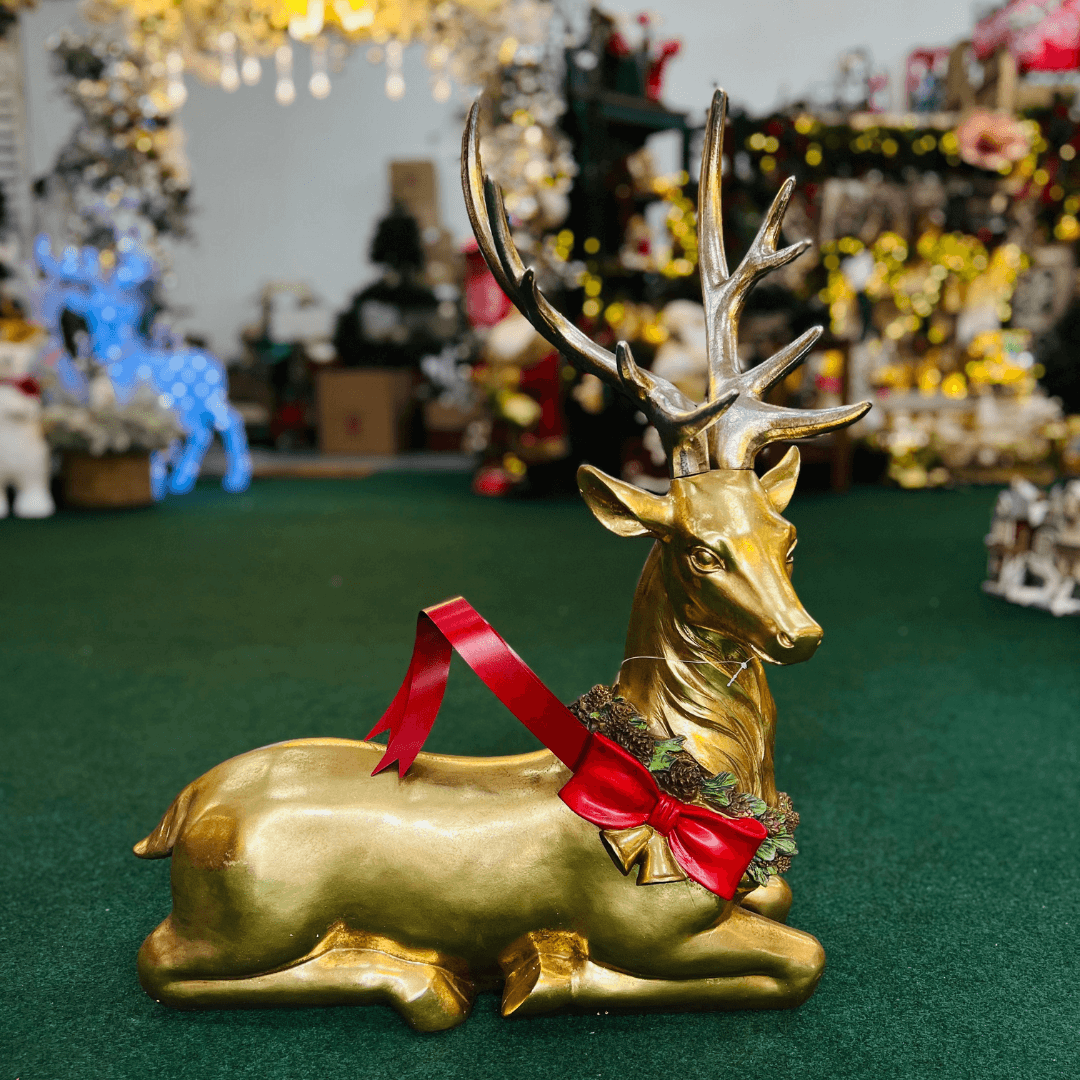 Rena Dourada Deitada com Laço – 75cm