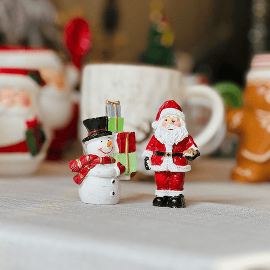 Conjunto Papai Noel e Boneco de Neve de Resina 4,5x3x7,5cm