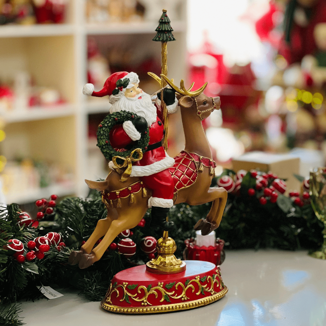 Papai Noel no Carrossel Vermelho de Resina 45,5x28,6cm