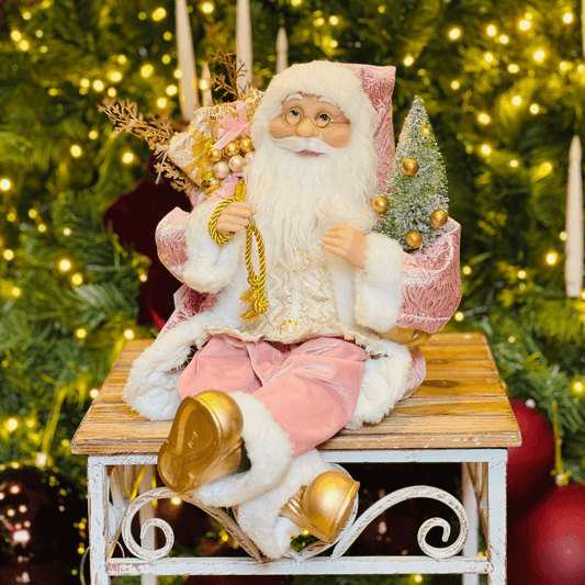 Papai Noel Sentado Com Presentes Rosa 28cm