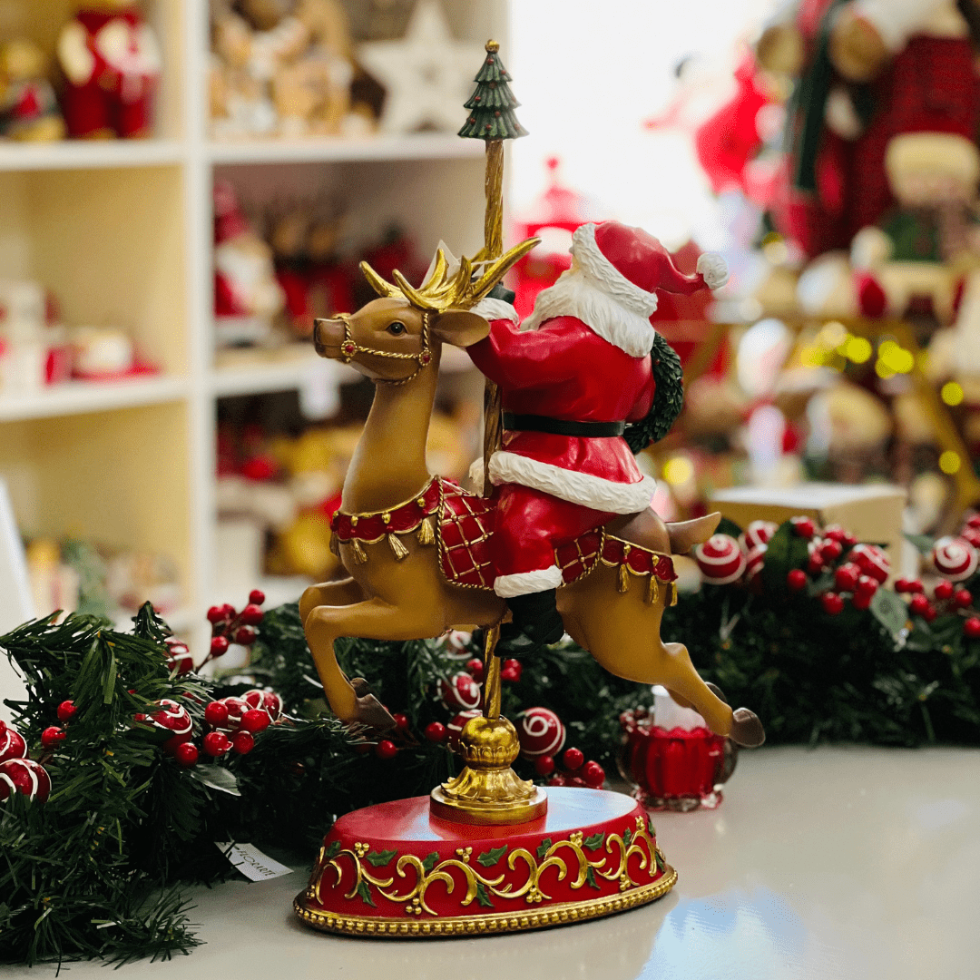 Papai Noel no Carrossel Vermelho de Resina 45,5x28,6cm