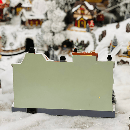 Vila Colorida Natalina Com Led e Movimento 28x9x20cm