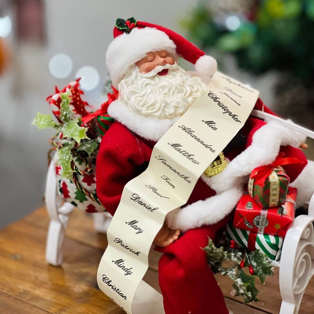 Papai Noel no banco com presentes - 20cm