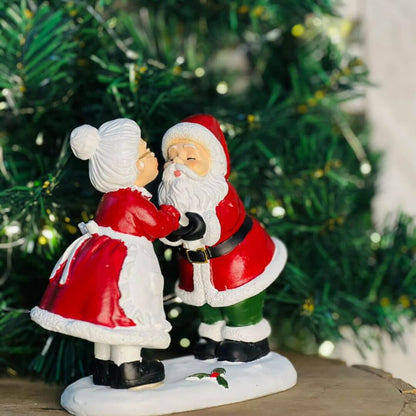 Natal Mamae e Papai Noel Beijo