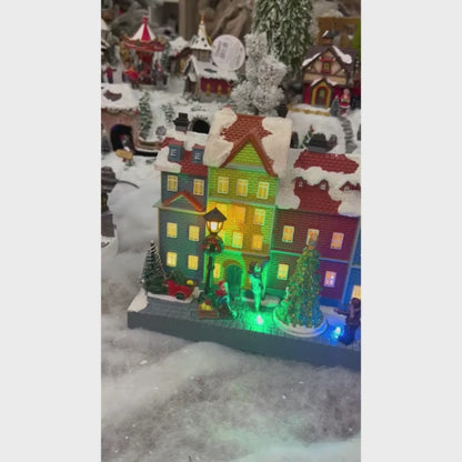 Vila Colorida Natalina Com Led e Movimento 28x9x20cm